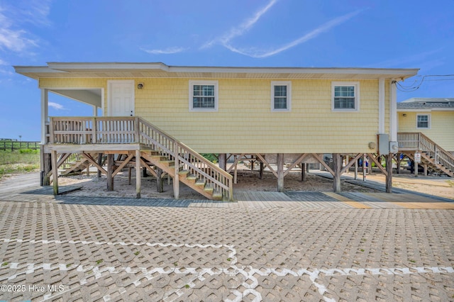 1020 Carolina Beach Ave N, Carolina Beach, NC 28428 - view of front facade featuring stairs