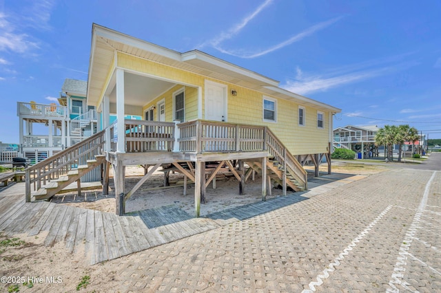 1020 Carolina Beach Ave N, Carolina Beach, NC 28428 - view of front facade featuring stairs