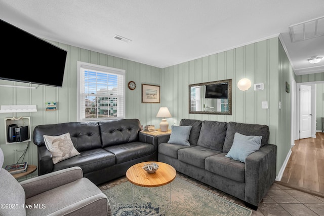 1020 Carolina Beach Ave N, Carolina Beach, NC 28428 - tiled living area featuring crown molding and baseboards