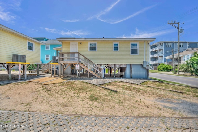 1020 Carolina Beach Ave N, Carolina Beach, NC 28428 - rear view of property with stairs