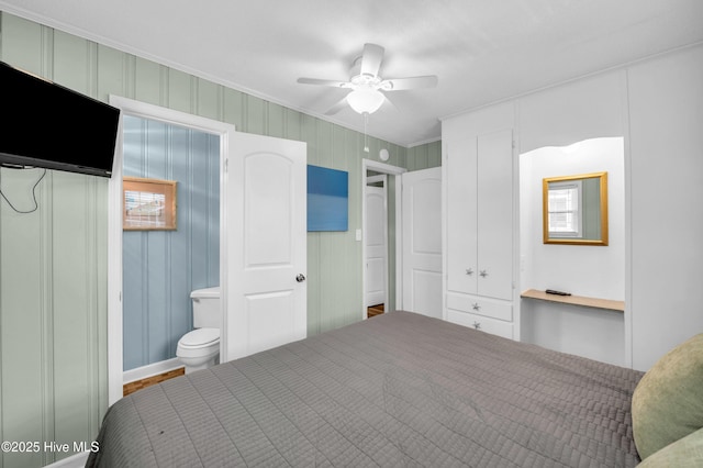 1020 Carolina Beach Ave N, Carolina Beach, NC 28428 - bedroom featuring crown molding and a ceiling fan
