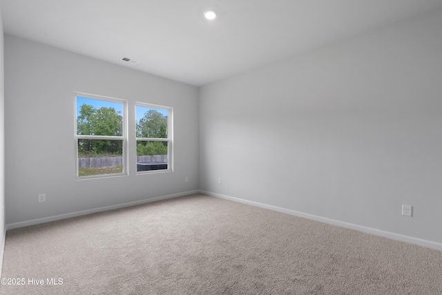 250 Arnette Dr Unit 83B, Ocean Isle Beach, NC 28469 - empty room featuring baseboards and carpet floors