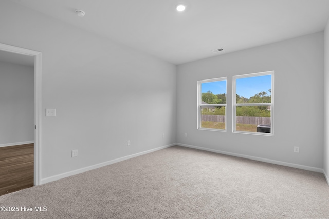 250 Arnette Dr Unit 83B, Ocean Isle Beach, NC 28469 - spare room featuring baseboards, carpet, a smoke detector, and recessed lighting