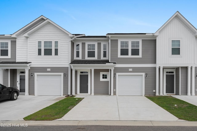 250 Arnette Dr Unit 83B, Ocean Isle Beach, NC 28469 - view of property with concrete driveway and an attached garage