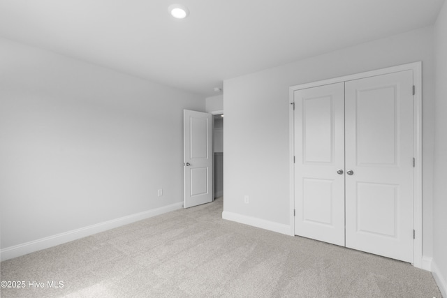 250 Arnette Dr Unit 83B, Ocean Isle Beach, NC 28469 - unfurnished bedroom with carpet, baseboards, a closet, and recessed lighting