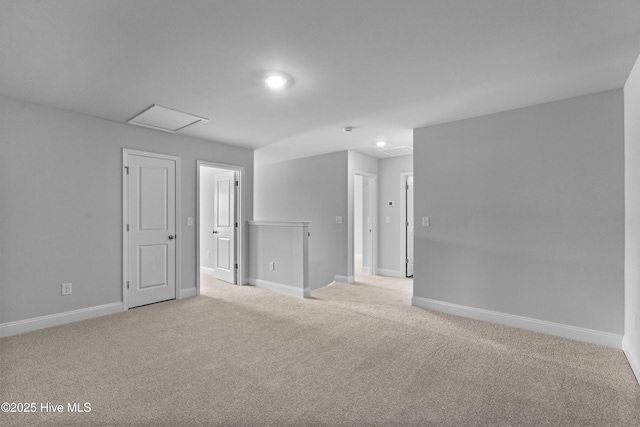 250 Arnette Dr Unit 83B, Ocean Isle Beach, NC 28469 - spare room with light carpet, recessed lighting, baseboards, and attic access