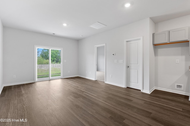 250 Arnette Dr Unit 83B, Ocean Isle Beach, NC 28469 - spare room with dark wood finished floors, baseboards, and recessed lighting