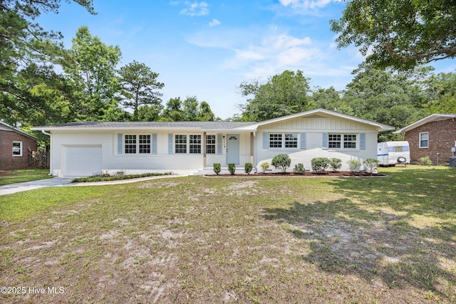 352 Brenda Dr, Wilmington, NC 28409 - single story home featuring a garage, a front yard, and driveway