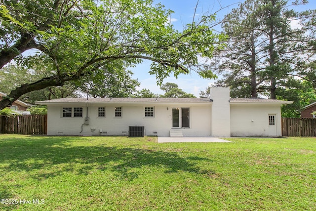 352 Brenda Dr, Wilmington, NC 28409 - back of house featuring crawl space, central AC unit, a patio area, and a chimney