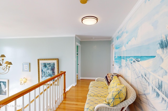 306 Marina Way N, Topsail Beach, NC 28460 - hallway with crown molding, light wood finished floors, baseboards, and an upstairs landing