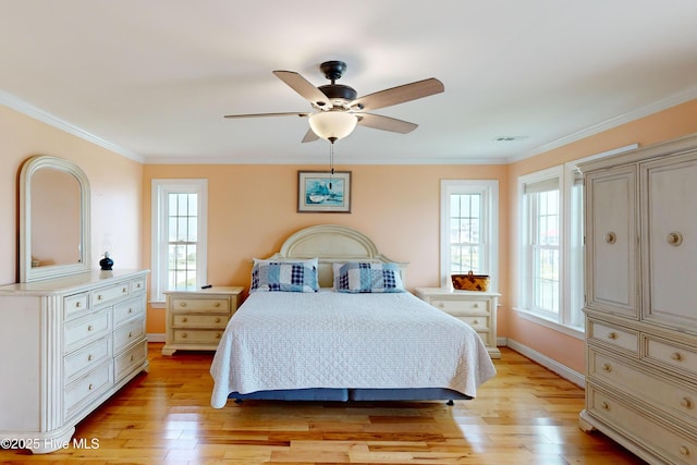 306 Marina Way N, Topsail Beach, NC 28460 - bedroom featuring light wood-style flooring, crown molding, baseboards, and a ceiling fan