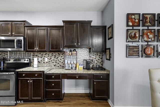 700 Stafford Ln, Jacksonville, NC 28546 - kitchen featuring stainless steel appliances, backsplash, dark wood-type flooring, and dark brown cabinets