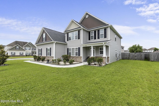 700 Stafford Ln, Jacksonville, NC 28546 - view of front of property with stone siding, board and batten siding, and a porch
