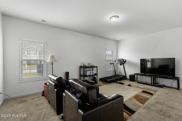 700 Stafford Ln, Jacksonville, NC 28546 - living room with light colored carpet and baseboards