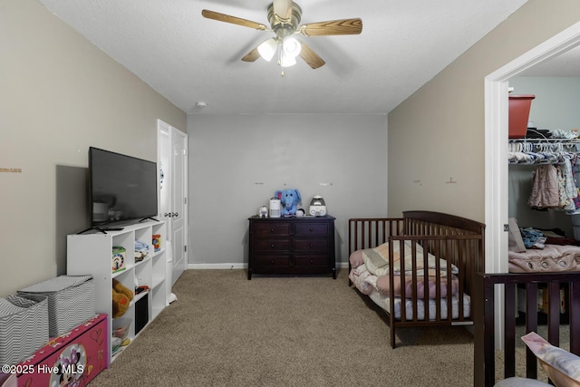 700 Stafford Ln, Jacksonville, NC 28546 - carpeted bedroom with a ceiling fan and baseboards