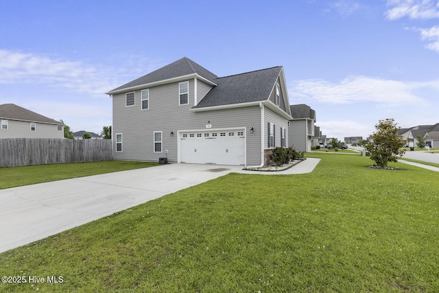 700 Stafford Ln, Jacksonville, NC 28546 - view of home's exterior with driveway, an attached garage, and roof with shingles