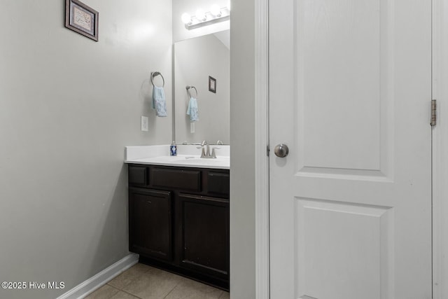 700 Stafford Ln, Jacksonville, NC 28546 - bathroom featuring vanity, tile patterned flooring, and baseboards