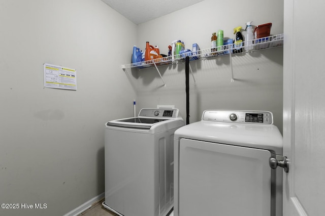 700 Stafford Ln, Jacksonville, NC 28546 - washroom with washer and dryer and baseboards