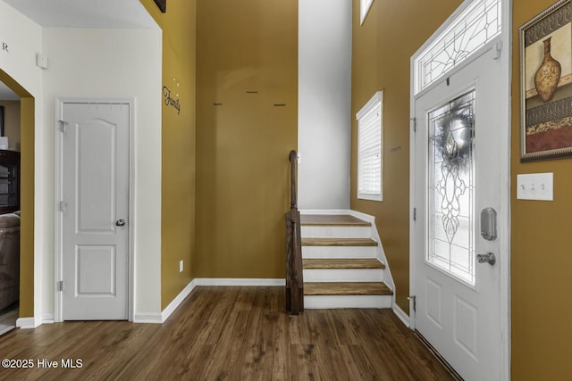 700 Stafford Ln, Jacksonville, NC 28546 - foyer entrance with wood finished floors, plenty of natural light, baseboards, and stairway