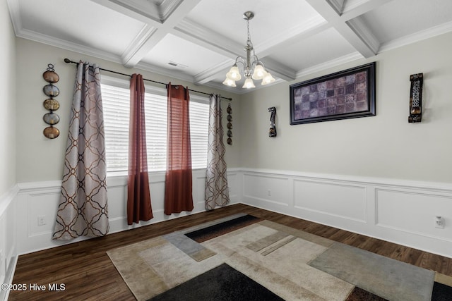 700 Stafford Ln, Jacksonville, NC 28546 - unfurnished room featuring dark wood-style floors, a chandelier, coffered ceiling, beamed ceiling, and a wainscoted wall