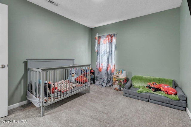 618 Godette School Rd, Havelock, NC 28532 - bedroom with carpet flooring, baseboards, and a textured ceiling