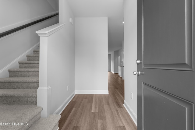 254 Arnette Dr Unit 82B, Shallotte, NC 28469 - staircase featuring wood finished floors and baseboards