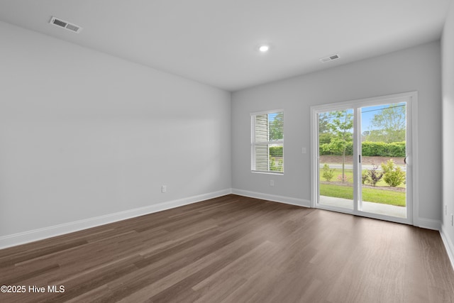254 Arnette Dr Unit 82B, Shallotte, NC 28469 - spare room with dark wood finished floors, baseboards, and recessed lighting