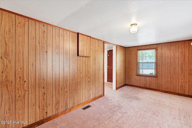110 Texanna Ln, Raeford, NC 28376 - empty room with carpet floors, baseboards, and wood walls