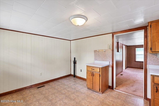 110 Texanna Ln, Raeford, NC 28376 - empty room featuring wood walls, baseboards, and light flooring
