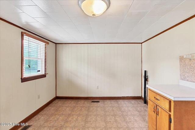 110 Texanna Ln, Raeford, NC 28376 - empty room with baseboards, crown molding, and wooden walls