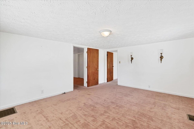 110 Texanna Ln, Raeford, NC 28376 - carpeted spare room with a textured ceiling and baseboards