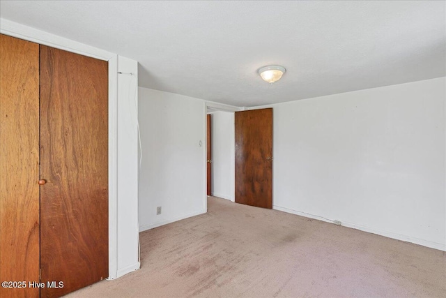 110 Texanna Ln, Raeford, NC 28376 - unfurnished bedroom featuring carpet, a closet, and baseboards