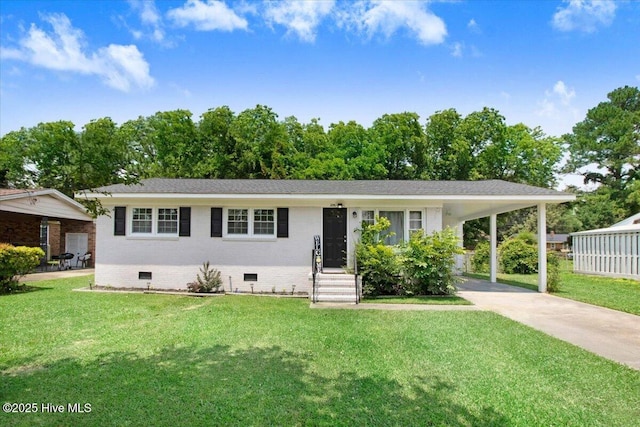 209 Bunche Dr, Goldsboro, NC 27530 - view of front of home with crawl space, driveway, a front yard, and a carport