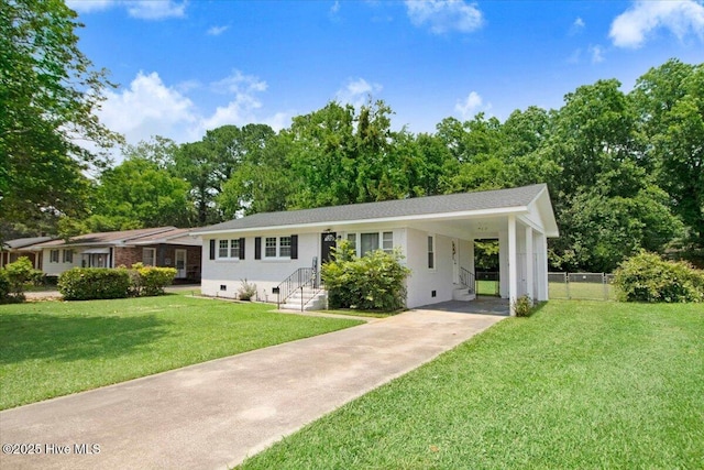 209 Bunche Dr, Goldsboro, NC 27530 - ranch-style house with driveway, a carport, entry steps, and view of scattered trees