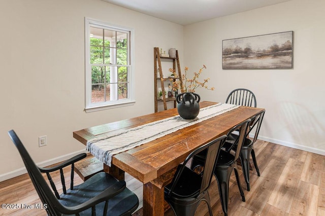 1809 E Indiana Ave, Southern Pines, NC 28387 - dining room featuring baseboards and light wood finished floors