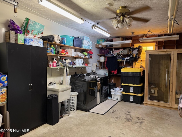 1809 E Indiana Ave, Southern Pines, NC 28387 - below grade area with washing machine and clothes dryer, ceiling fan, a sink, and a textured ceiling