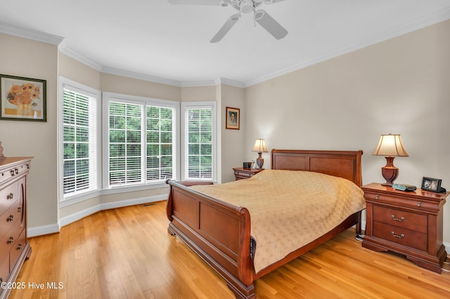 423 White Columns Way, Wilmington, NC 28411 - bedroom featuring light wood finished floors, crown molding, baseboards, and ceiling fan