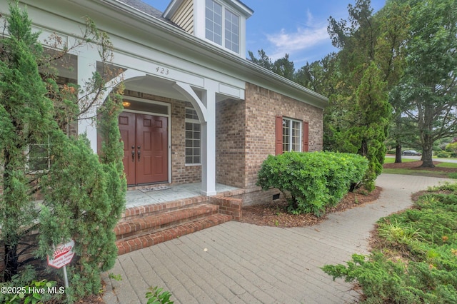 423 White Columns Way, Wilmington, NC 28411 - doorway to property featuring brick siding and crawl space