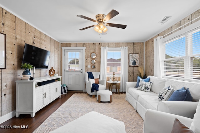 2767 Nags Head Rd SW, Supply, NC 28462 - living area featuring dark wood-style flooring, a ceiling fan, and baseboards