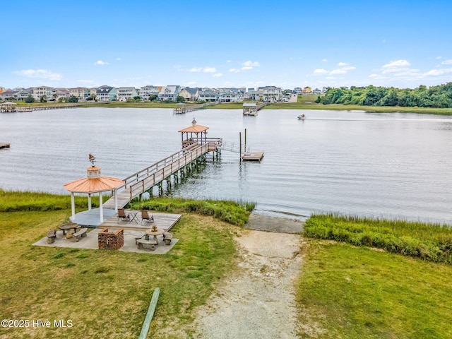 2767 Nags Head Rd SW, Supply, NC 28462 - dock featuring a gazebo, a water view, a patio area, and a residential view