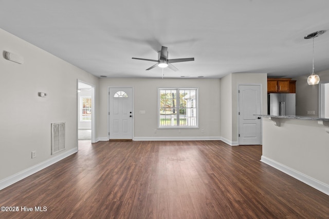 106 Waterside Dr, Bath, NC 27808 - unfurnished living room with dark wood finished floors, a ceiling fan, and baseboards