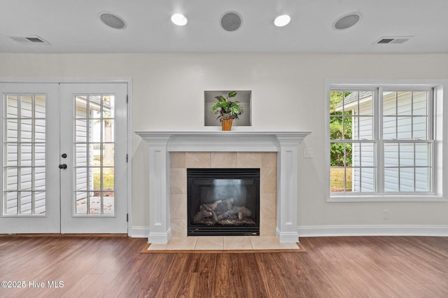 106 Waterside Dr, Bath, NC 27808 - unfurnished living room featuring wood finished floors, baseboards, and french doors