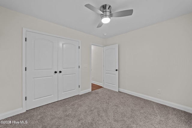 106 Waterside Dr, Bath, NC 27808 - unfurnished bedroom with carpet floors, a closet, baseboards, and ceiling fan