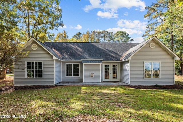106 Waterside Dr, Bath, NC 27808 - back of property with french doors, a shingled roof, and a yard