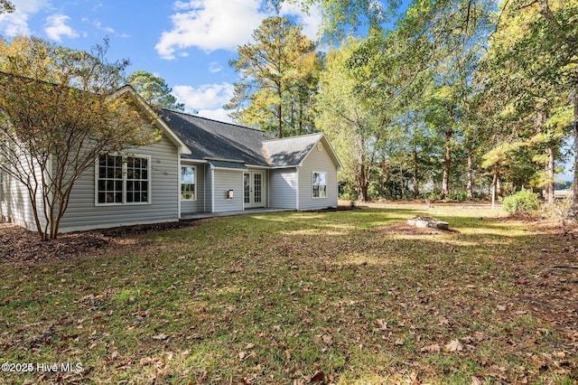 106 Waterside Dr, Bath, NC 27808 - back of house featuring french doors, a lawn, and a shingled roof