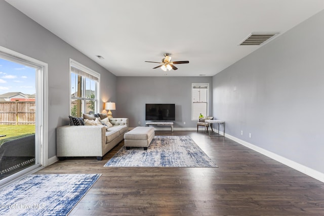 737 Heartwood Dr, Leland, NC 28479 - living room with ceiling fan, wood finished floors, and baseboards