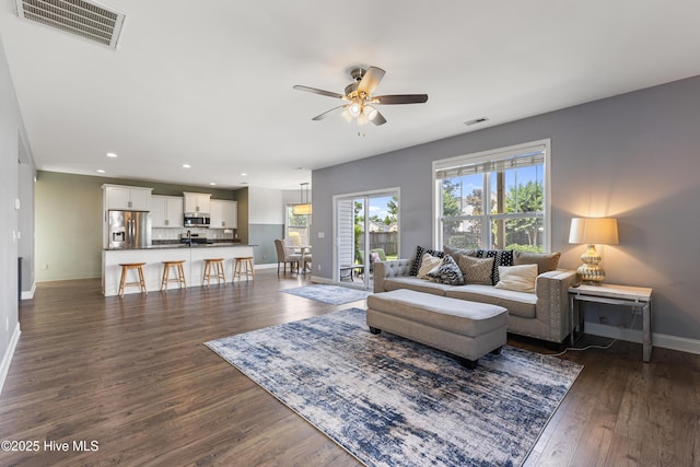 737 Heartwood Dr, Leland, NC 28479 - living room featuring baseboards, a ceiling fan, recessed lighting, and dark wood-style floors
