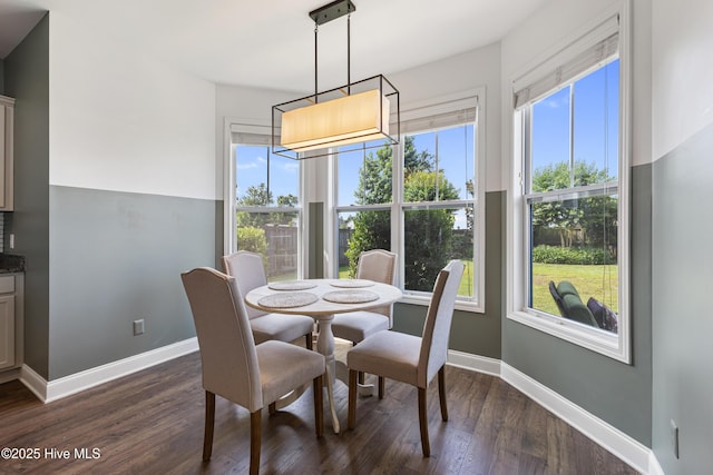 737 Heartwood Dr, Leland, NC 28479 - dining space featuring dark wood-style flooring, healthy amount of natural light, and baseboards