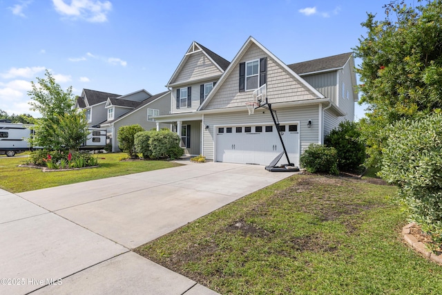 737 Heartwood Dr, Leland, NC 28479 - craftsman-style house featuring concrete driveway, a garage, and a front lawn