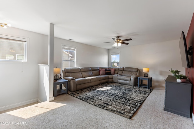 737 Heartwood Dr, Leland, NC 28479 - carpeted living room with a ceiling fan and baseboards